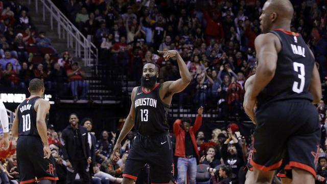 Harden celebrates after hitting a three pointer for the Rockets.