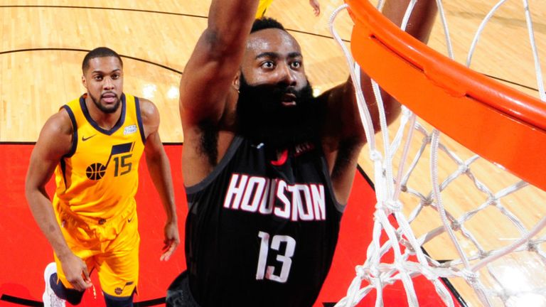 Harden of the Rockets dunks on the Jazz defenders