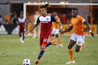 Elis of the Dynamo looks to make a play on the ball against FC Dallas.