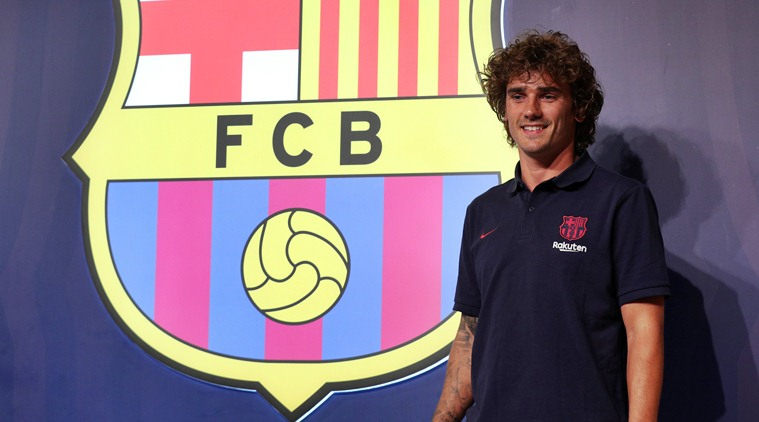 French star Griezmann poses after he finally got his transfer to FC Barcelona